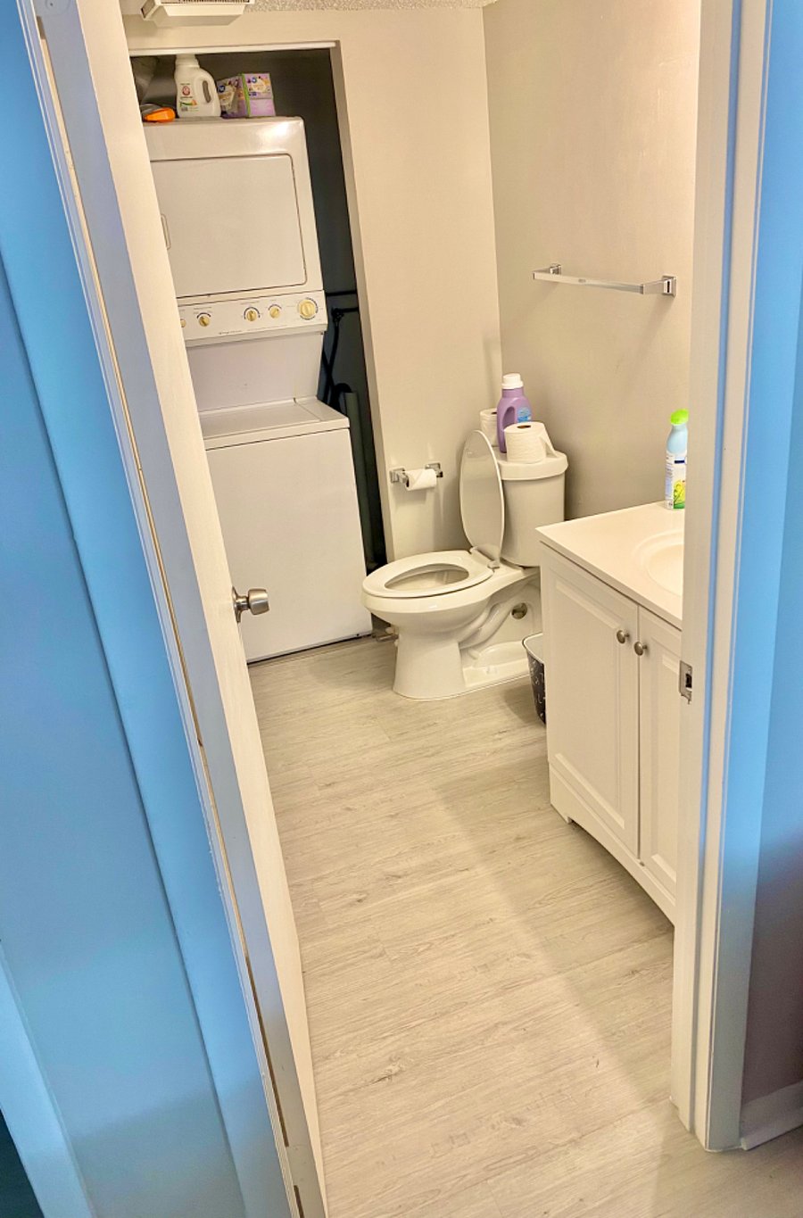 Downstairs half bath with washer and dryer