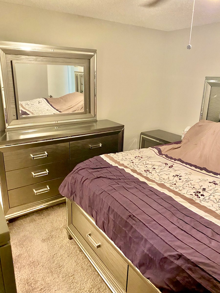 Large kind bed, night stand, dresser ready for your items.