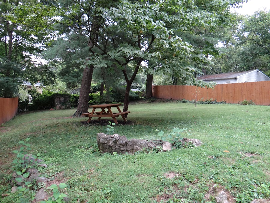 Large backyard with privacy fence
