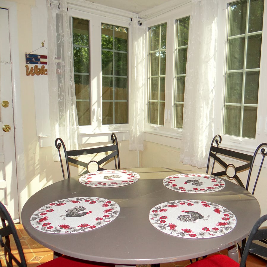Dining area is on a nice sunporch that overlooks the backyard