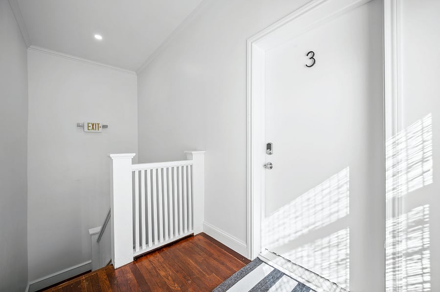 Second floor landing and entrance to apartment 3.