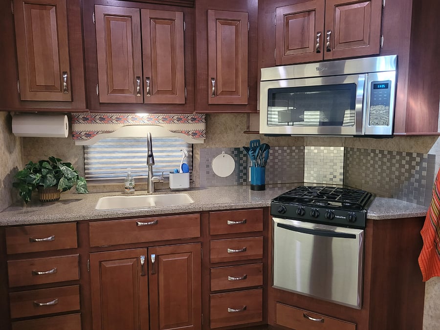 Fully stocked kitchen, extra storage in cabinets