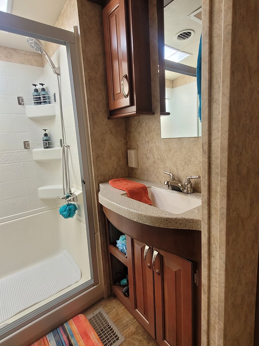 Fully stocked bathroom.