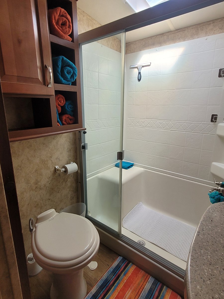 Porcelain commode. More storage above.