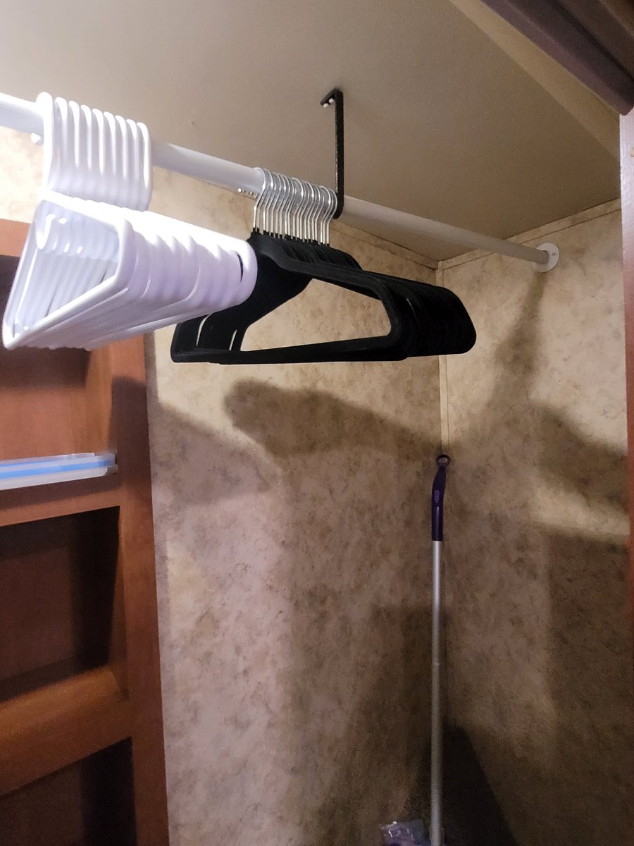 Closet rod runs full width of closet. Hangers available.