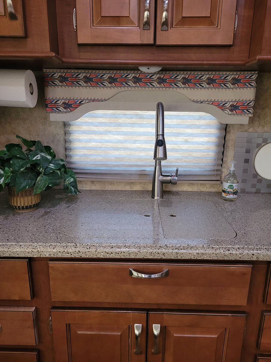Kitchen sink has two covers. Extends the counter area, when not needing the sink.