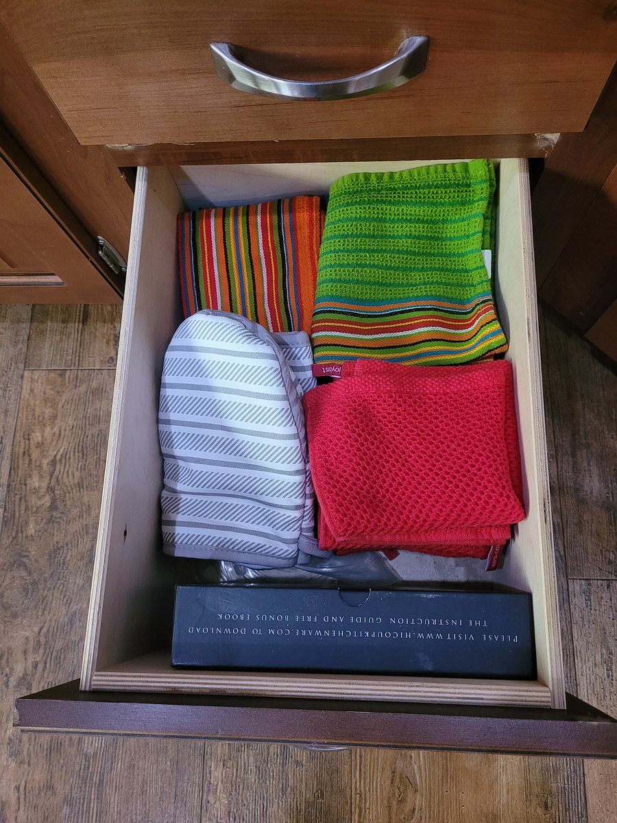 Dish towels, dish rags, pot holders, wine bottle opener.