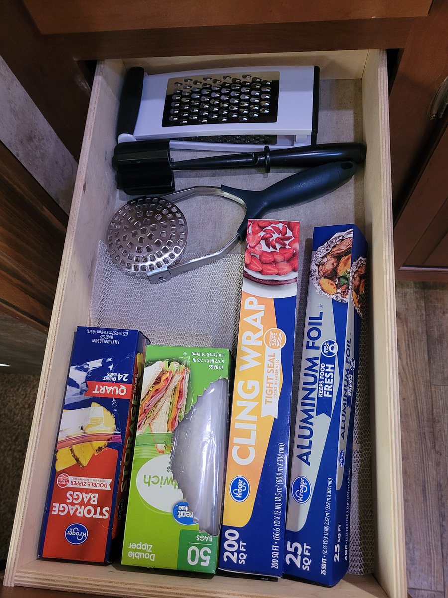 Storage bags, plastic wrap, foil, potato masher, ground meat crumbler, grater.