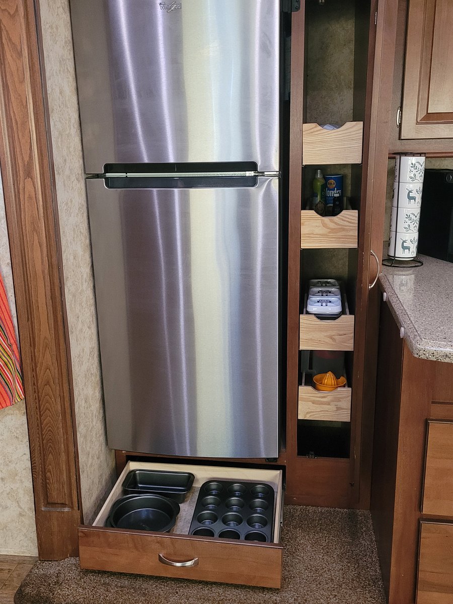 Apartment sized fridge.
Pull out pantry drawers.
Baking pans.