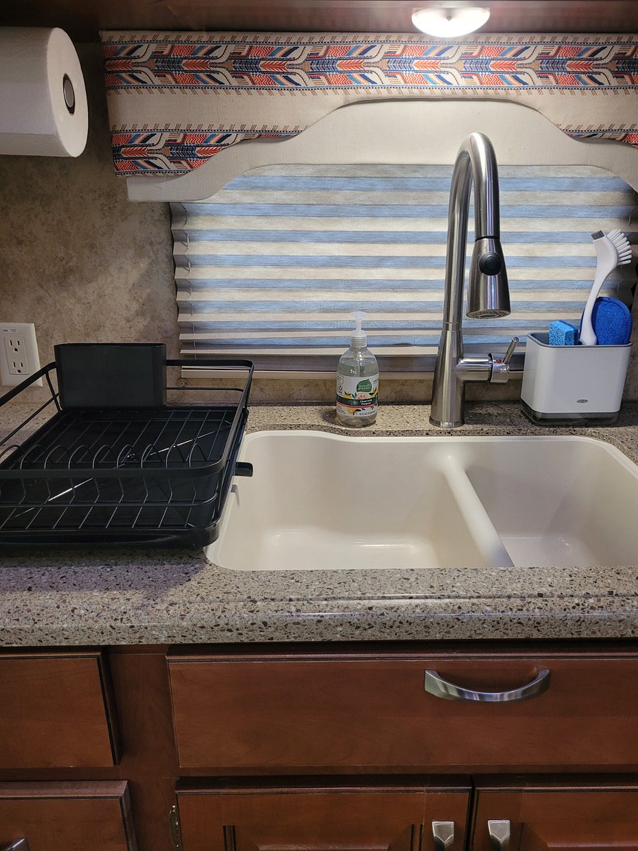 Dish drainer, has a funnel that keeps the water going into the sink, instead of all over the counter.