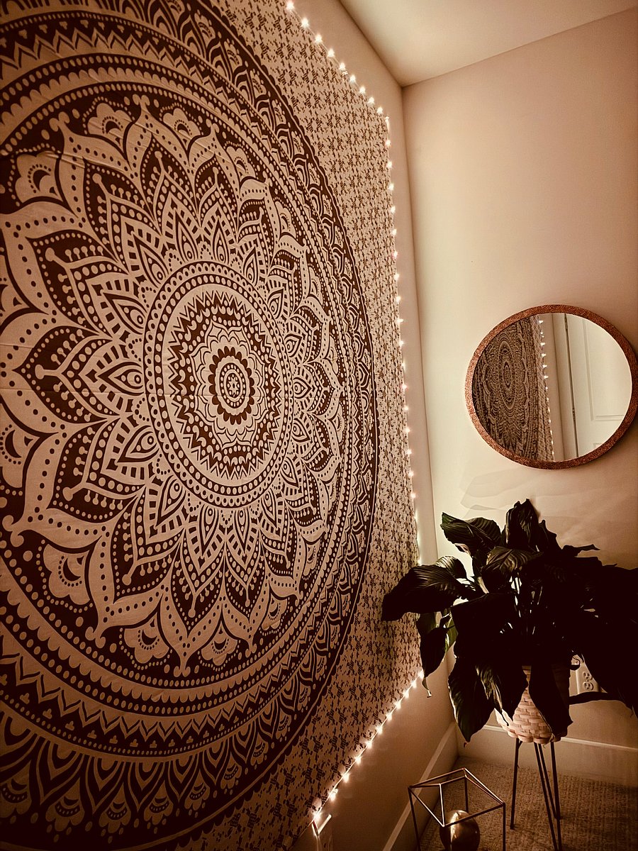 Meditate with this gorgeous tapestry, you can switch the light color to match your own unique vibe! 