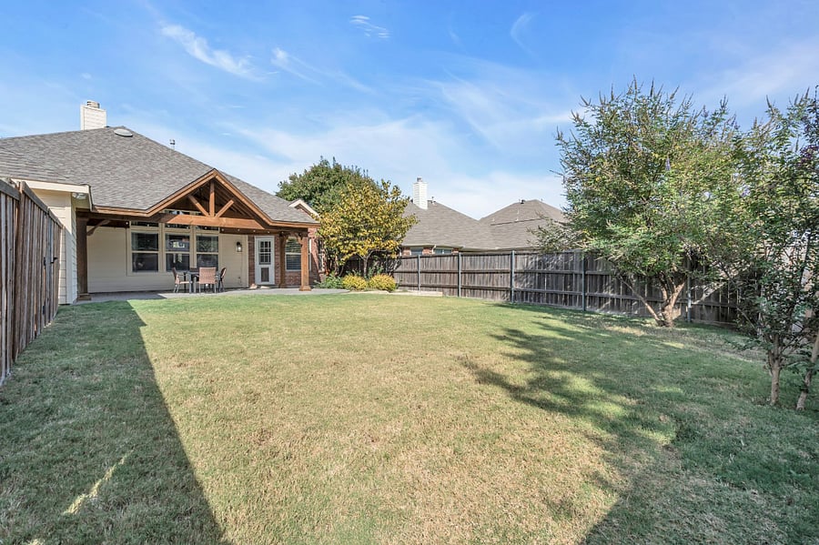 A large backyard with plenty of room for children or pets to roam.