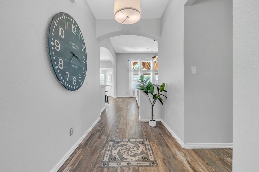 Hallway
A warm and inviting space that leads to additional bedrooms and family room.
