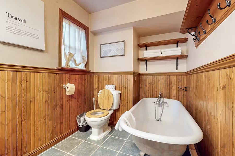 Downstairs bathroom with claw foot tub