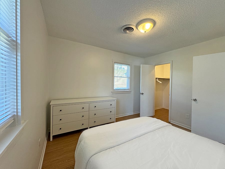 Primary bedroom with queen bed, luxury mattress and high quality cotton linens. Large closet and dresser.