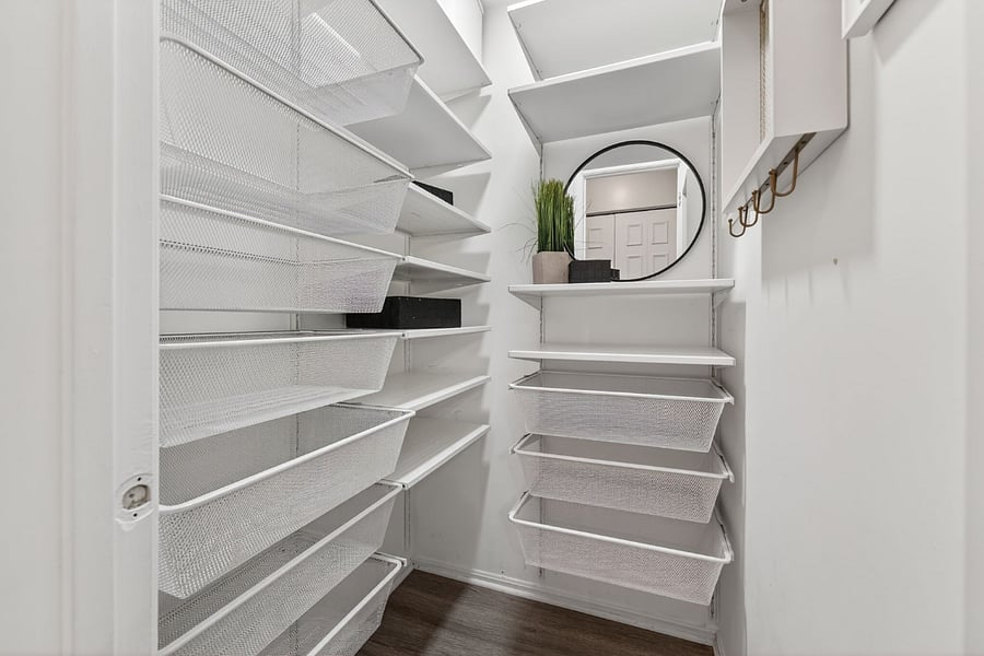 Primary bedroom closet 1