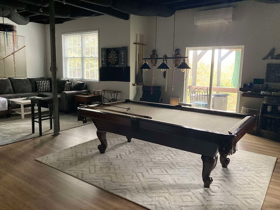 Game room with second level walk out deck