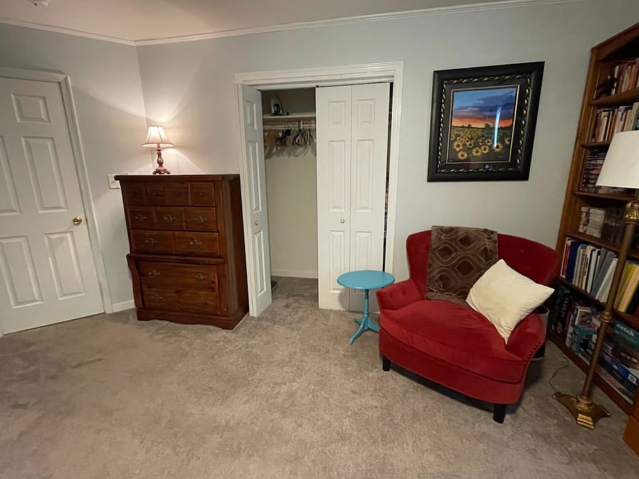 Your room - full-sized bed, desk, two dressers, tv with streaming, armchair, and bookcase.