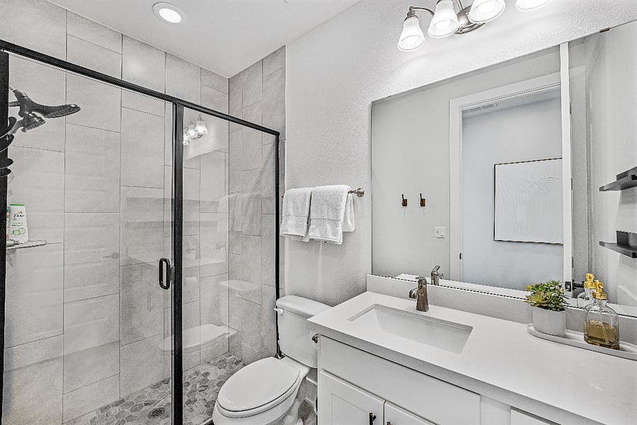 Bathroom #2: Downstairs full bathroom accessible to the common areas downstairs. This bathroom is steps away from the downstairs full-sized bedroom as well.