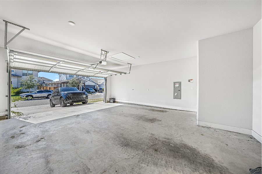 Two car garage with EV charging outlets (240V each)