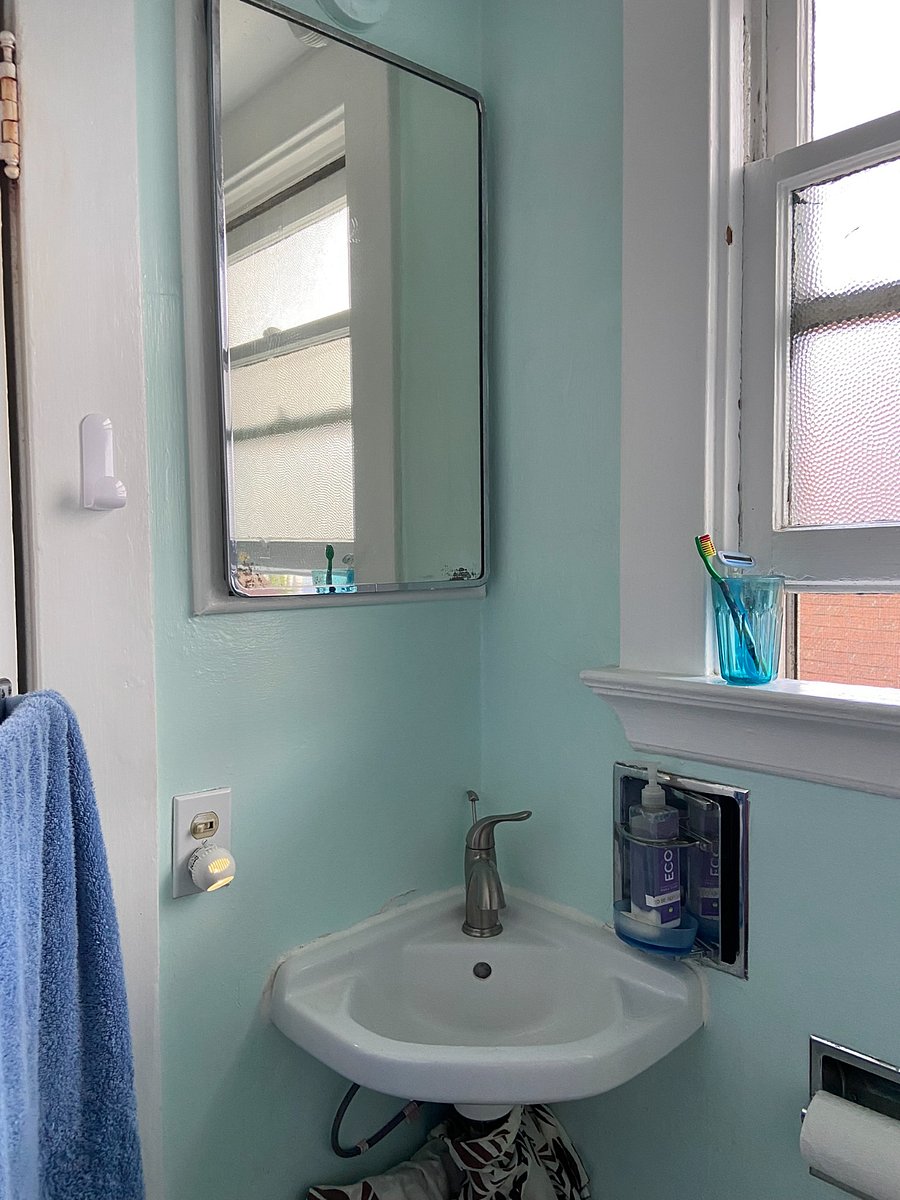 The bathroom is small, but efficient and just off the bedroom.