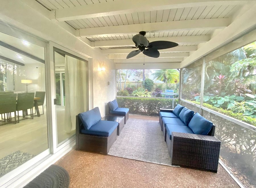 Screened in patio sitting area now features a green wall. (Not pictured)