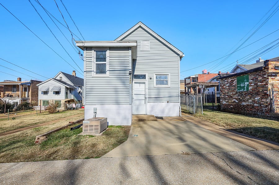 Rear View of House and Parking From Alley