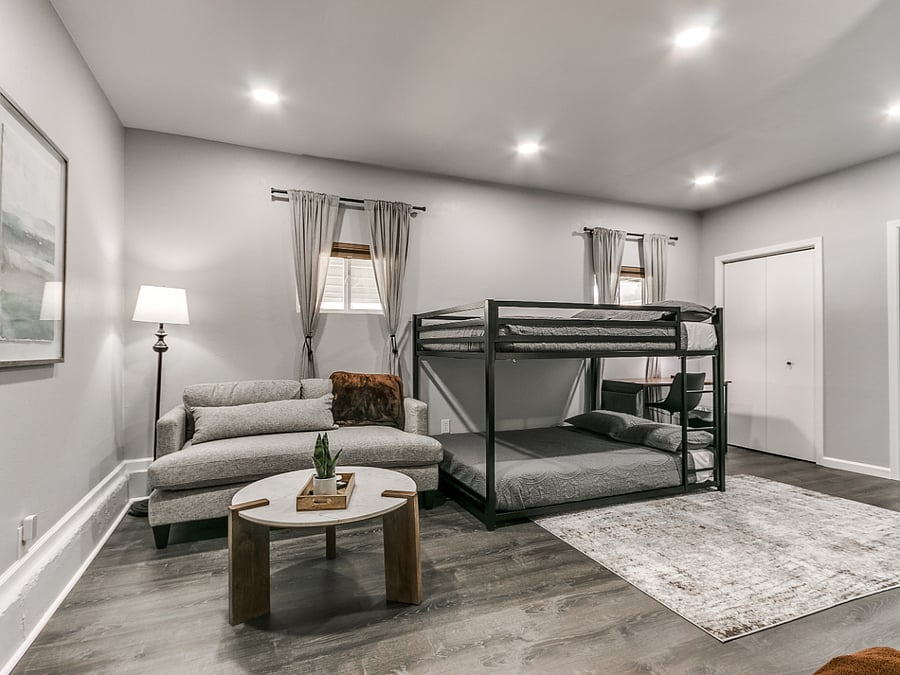 Bedroom #3 with full bunkbed, sofa and sofa table
