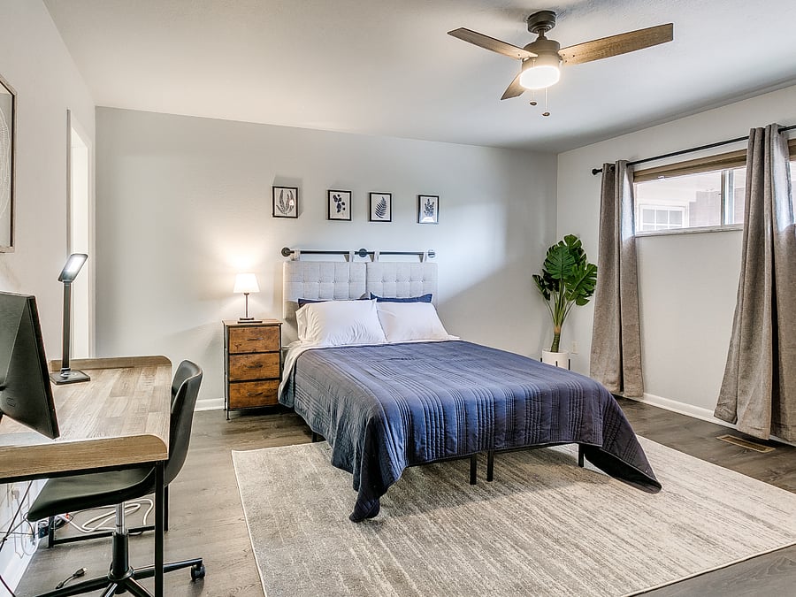 Master Bedroom with ensuite bathroom, walk-in closet, and office desk/chair.