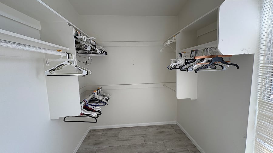 Large walk-in closet. Good for extra storage as well as clothing.