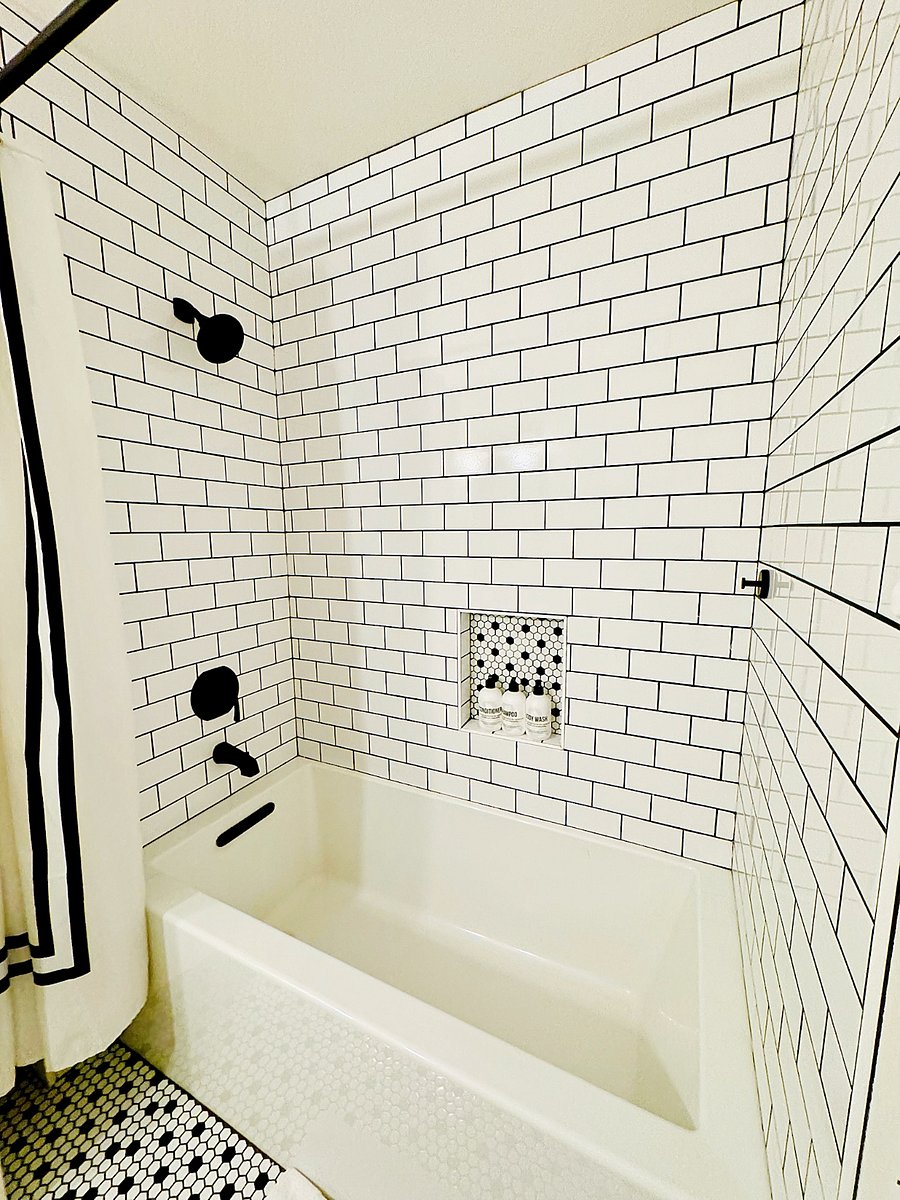 Guest Bathroom Located outside Bedrooms 2 & 3 - with deep tub and shower