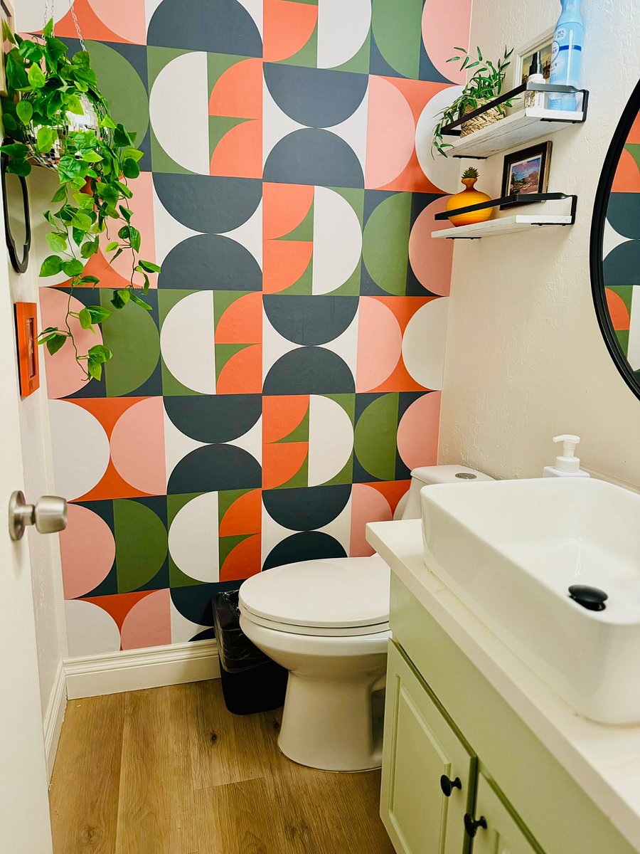 Powerder room located off of Kitchen (complete with storage closet)