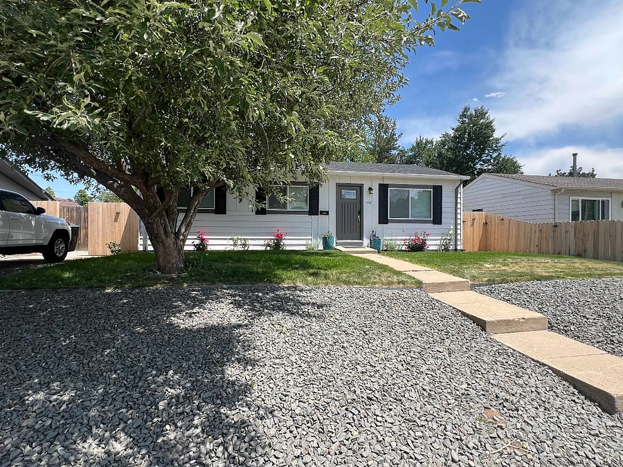 Front of house. Entrance to unit is gate on the right.