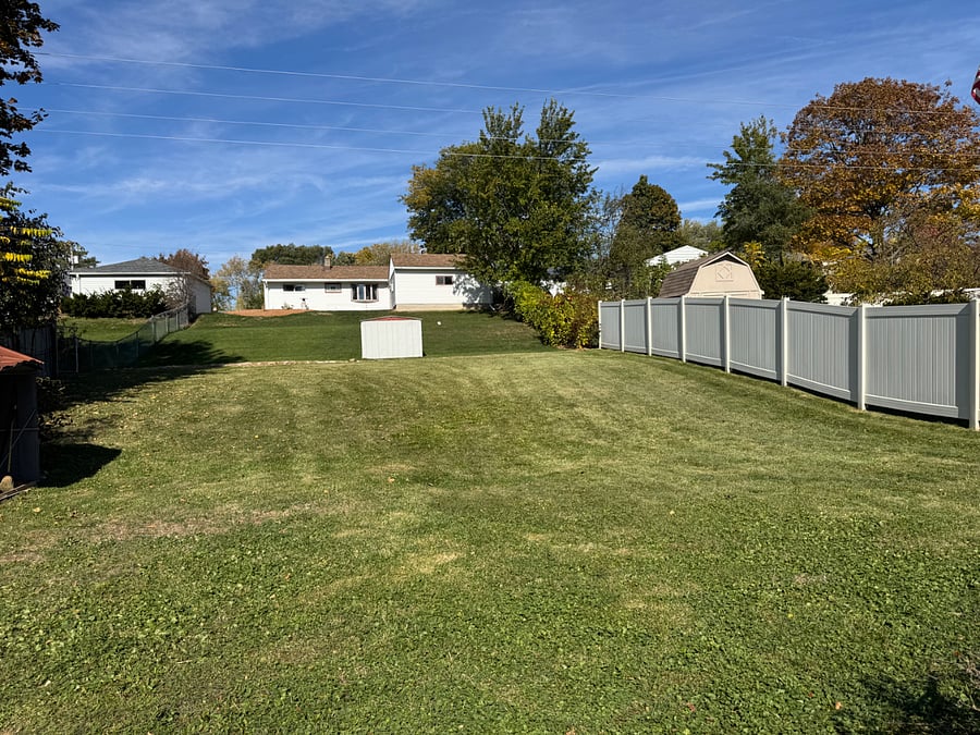 Large backyard, fenced on East & West side of the yard.