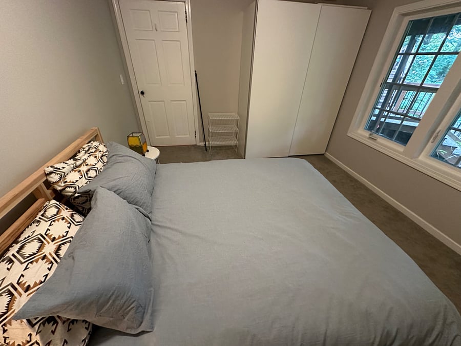 Queen bed with large armoire