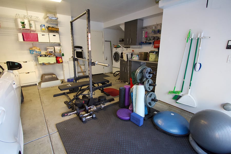 Private personal garage with gym. Includes squat rack, bench, weights, exercise ball and foam mate.