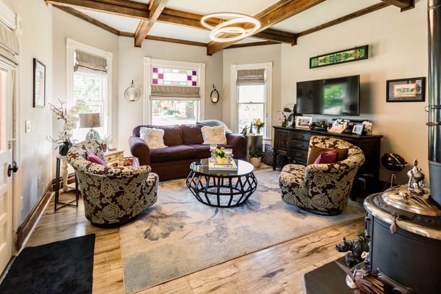 Plenty of space and entertainment options in the living room. Enjoy the Smart TV, Sound Bar, Wood stove, grab a book or a tablet, or just enjoy the peace and quiet of the setting.
