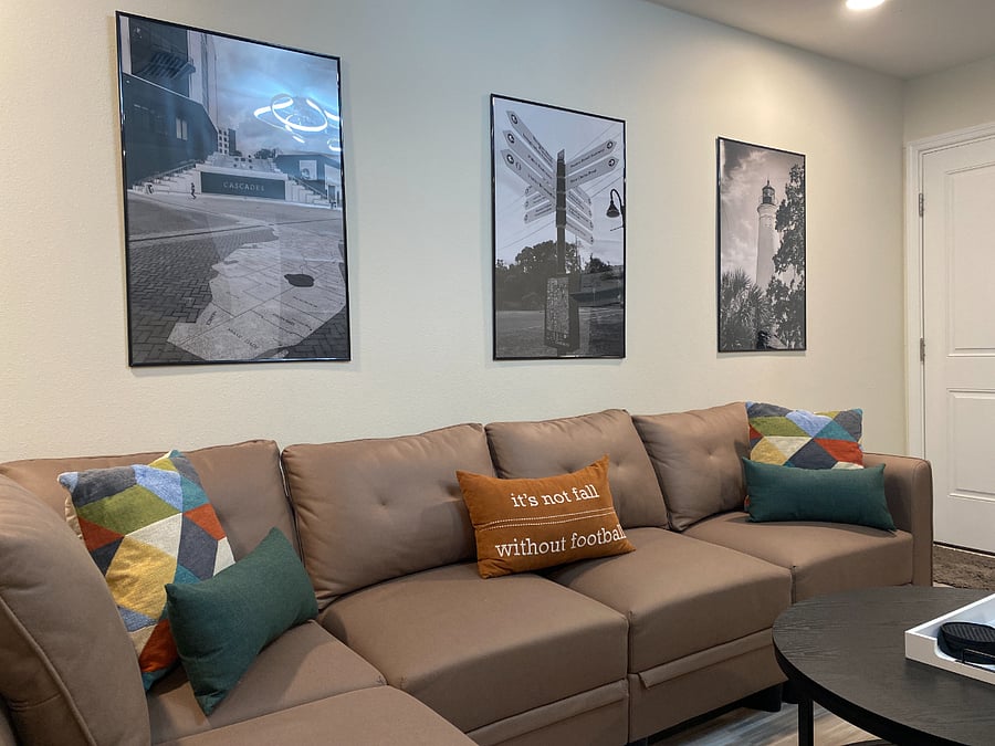 Welcome to our cozy family room! Sink into our spacious 6-seater modular sofas, explore our library, enjoy entertainment on the 50" TV, and indulge in fun with our selection of games. Perfect for quality time and relaxation!