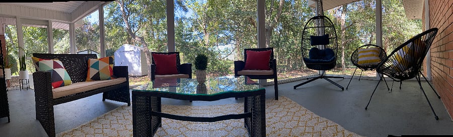 Escape to our patio oasis! Lounge on outdoor wicker furniture set with coffee table, wicker bar cart table, and swinging egg chair hammock, ideal for unwinding in style.