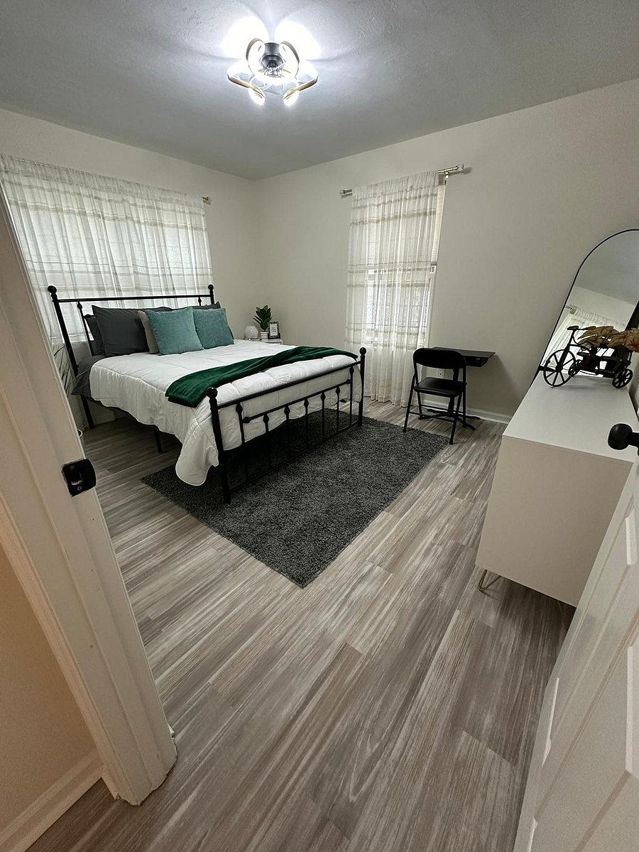 Welcome to your cozy retreat! Our third guest bedroom is thoughtfully appointed with all the essentials: a dresser, nightstand, closet, luggage rack, desk, 50"TV and mirrorensuring a comfortable stay for our cherished guests.