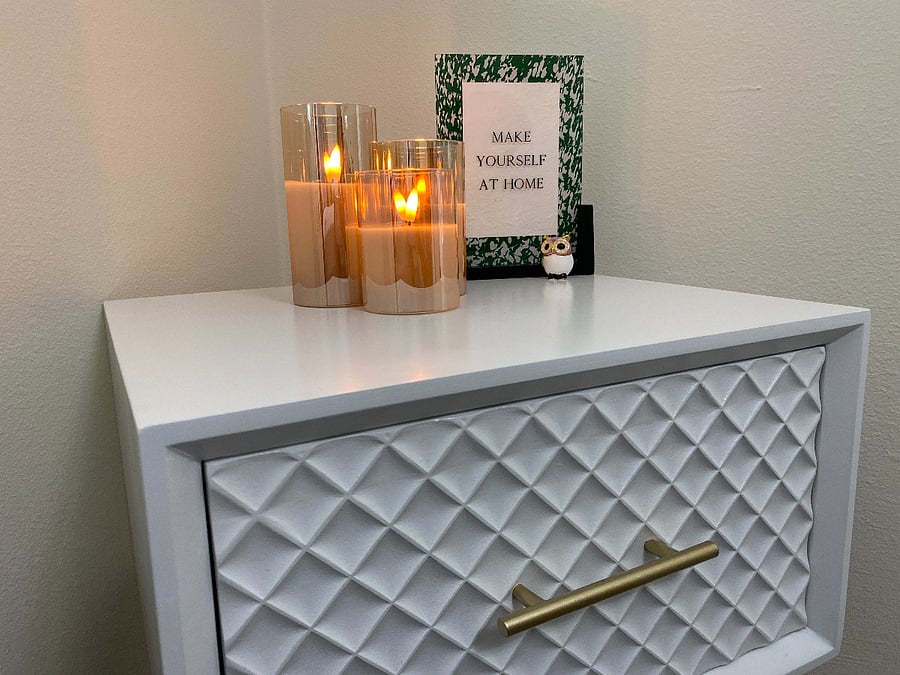 Welcome to your cozy retreat! Our third guest bedroom is thoughtfully appointed with all the essentials: a dresser, nightstand, closet, luggage rack, desk, 50"TV and mirrorensuring a comfortable stay for our cherished guests.