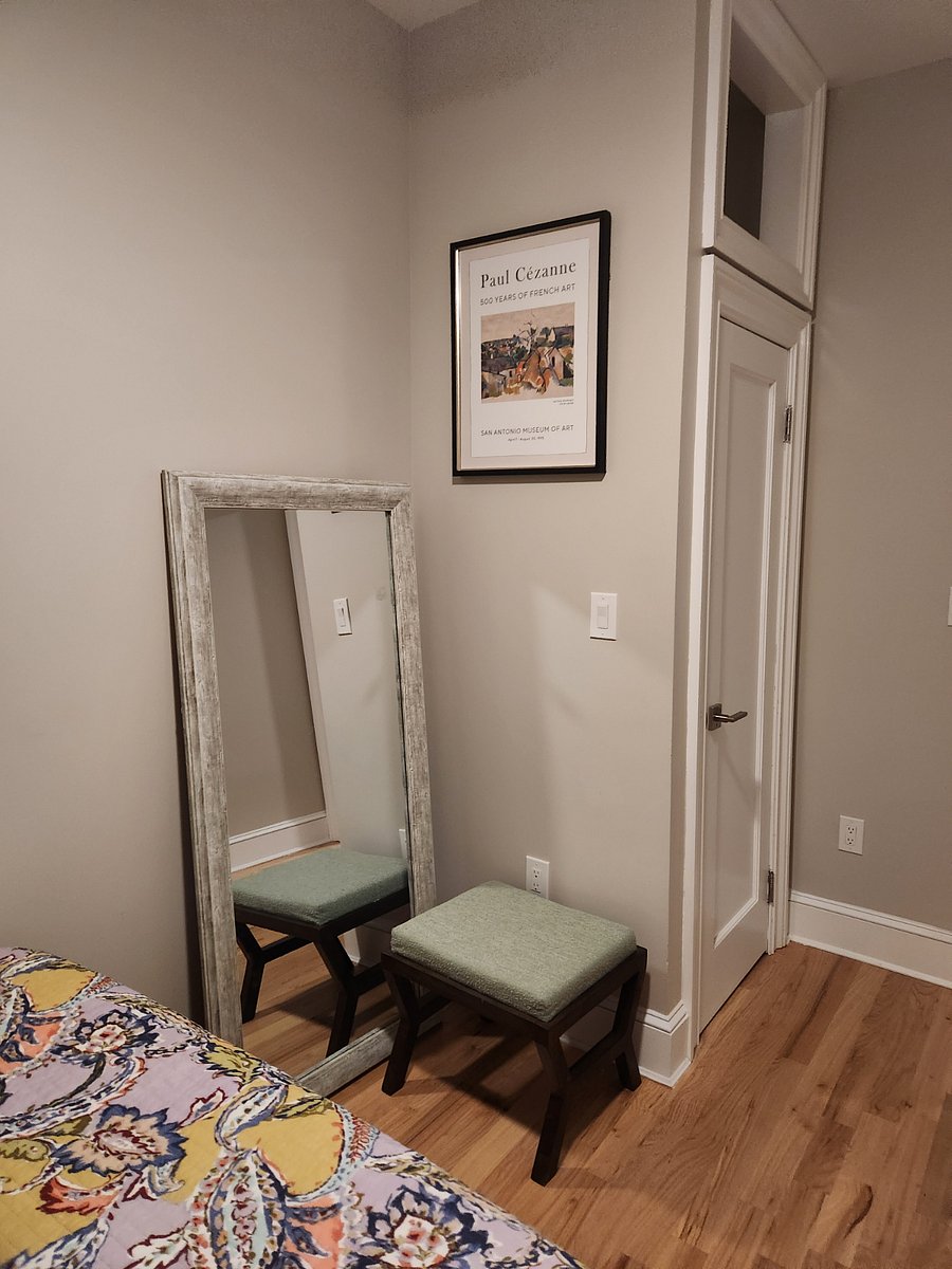 Mirror and closet in each bedroom.