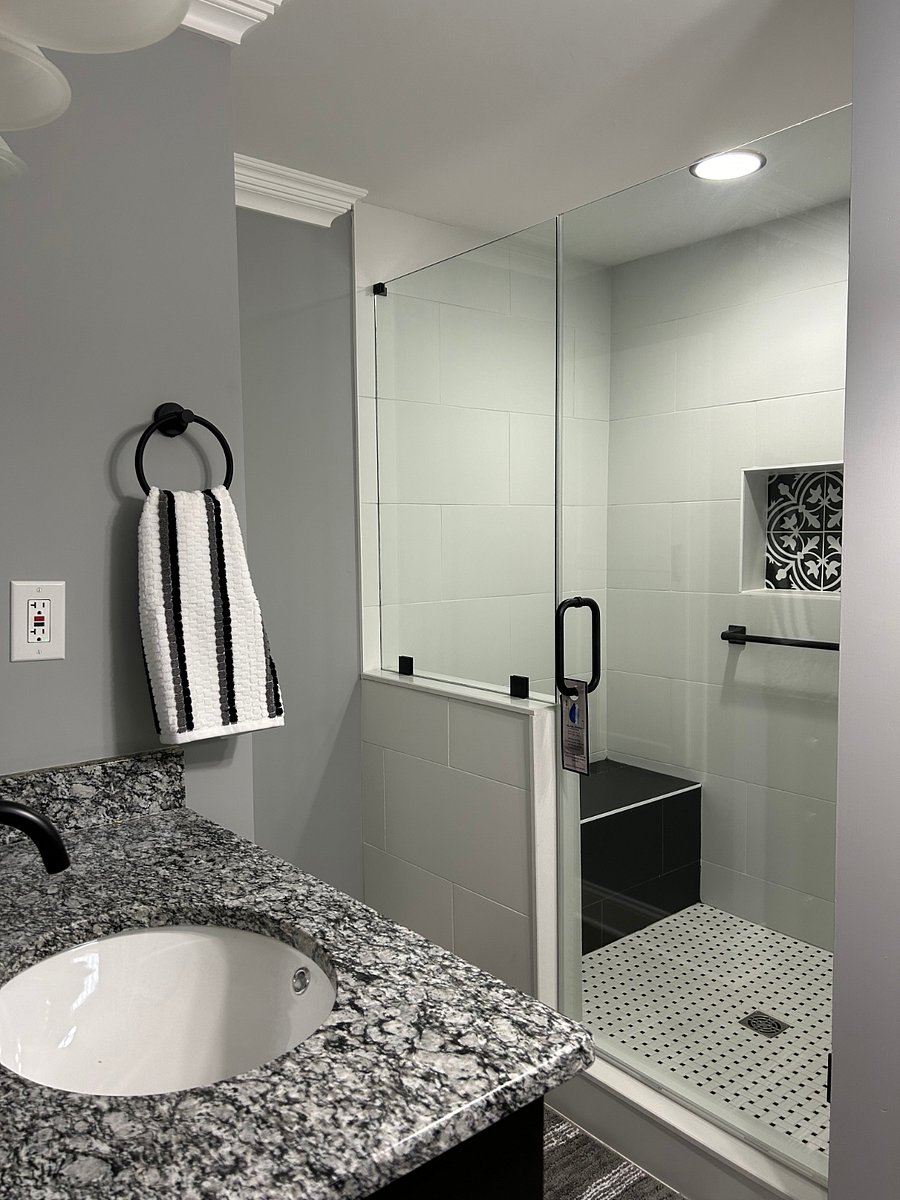 Master shower with bench for relaxing after a long day!