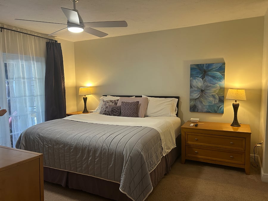 1st primary bedroom with en-suite spa style bathroom, large walk-in closet, addition closet, linen closet and pool/patio access. Smart tv 45 inch.