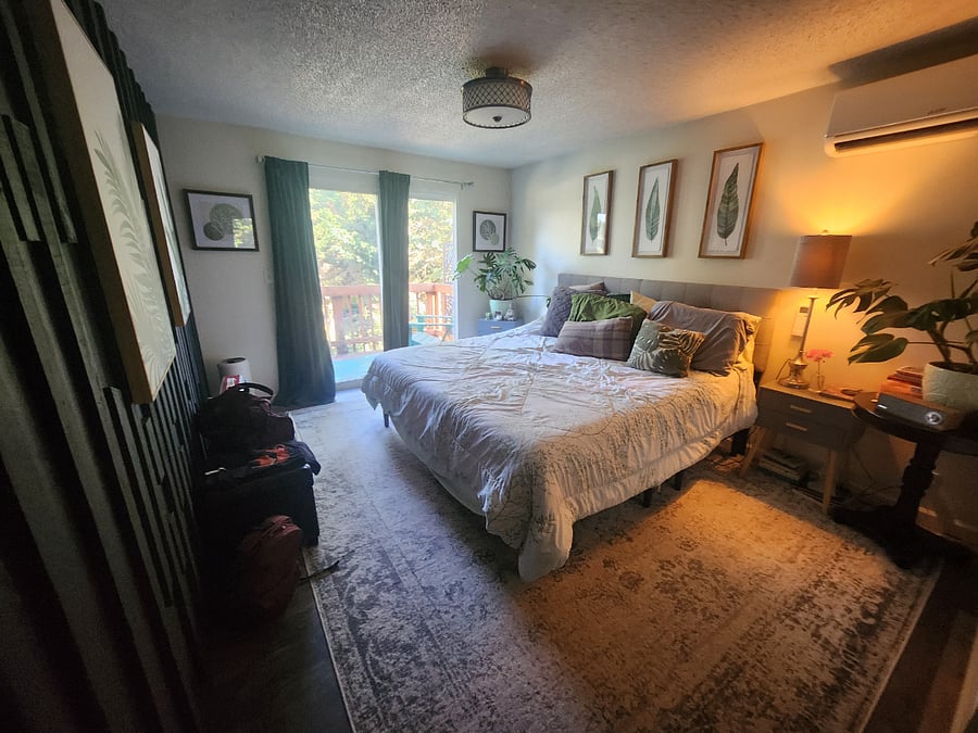Primary suite with deck, walk in closet and bathroom 