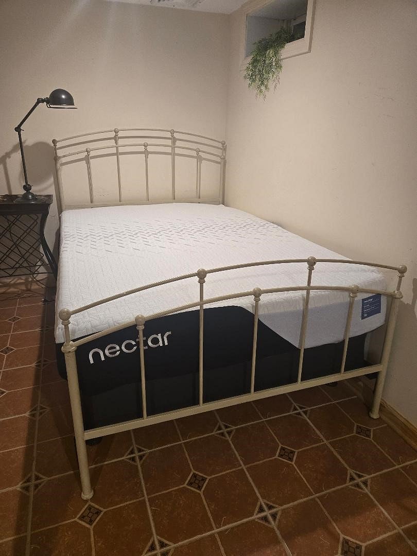 Brand new, never slept in full size bed. New bed mattress cover and new sheets. 