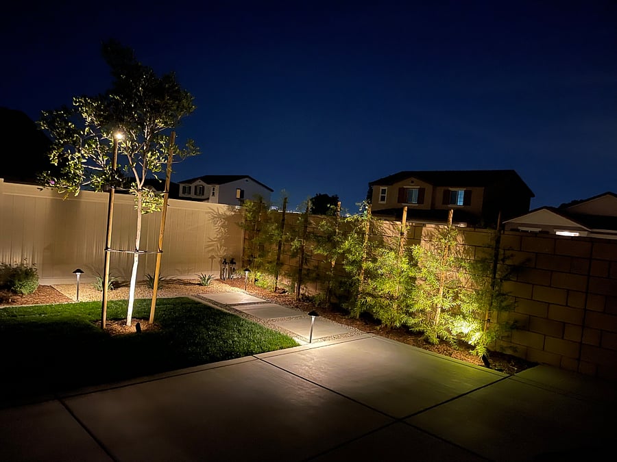 serene lighting, turning a backyard into a resort style environment