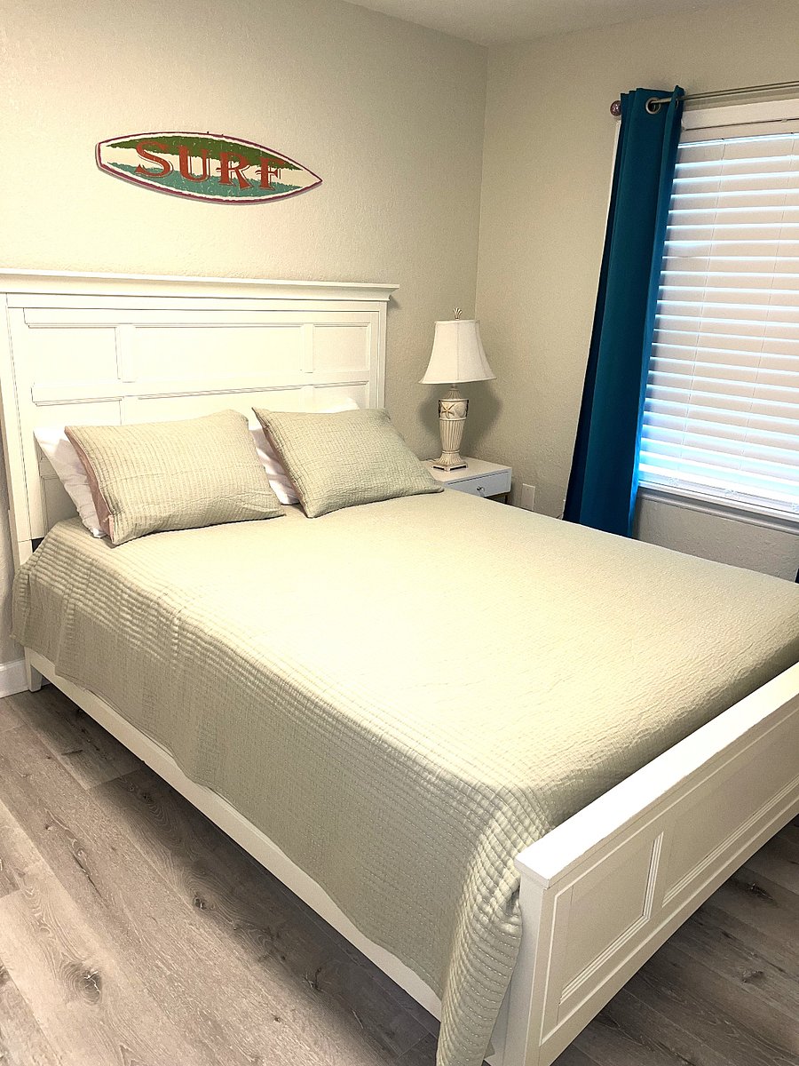 spare bedroom with queen bed