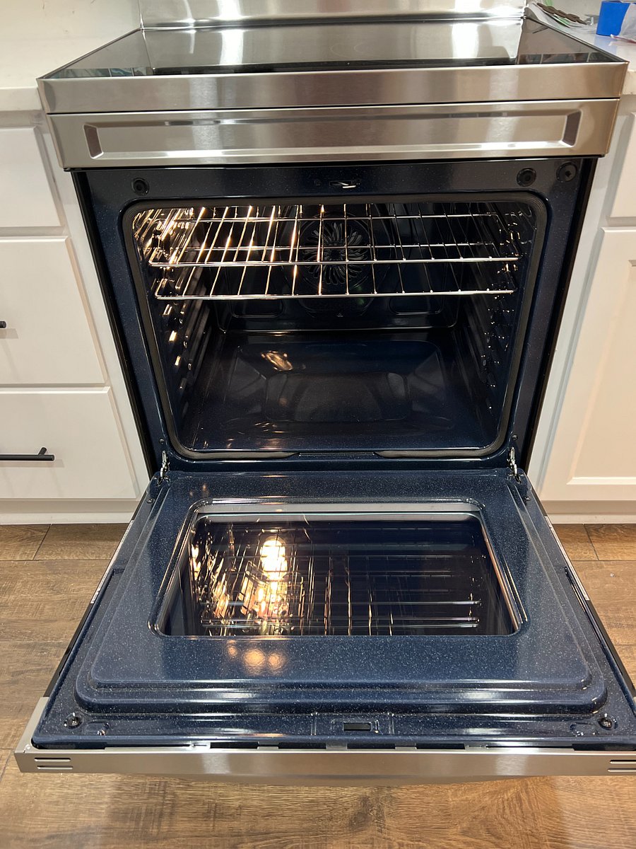 Brand new Samsung electric stove with large oven ready to cook a big Thanksgiving turkey