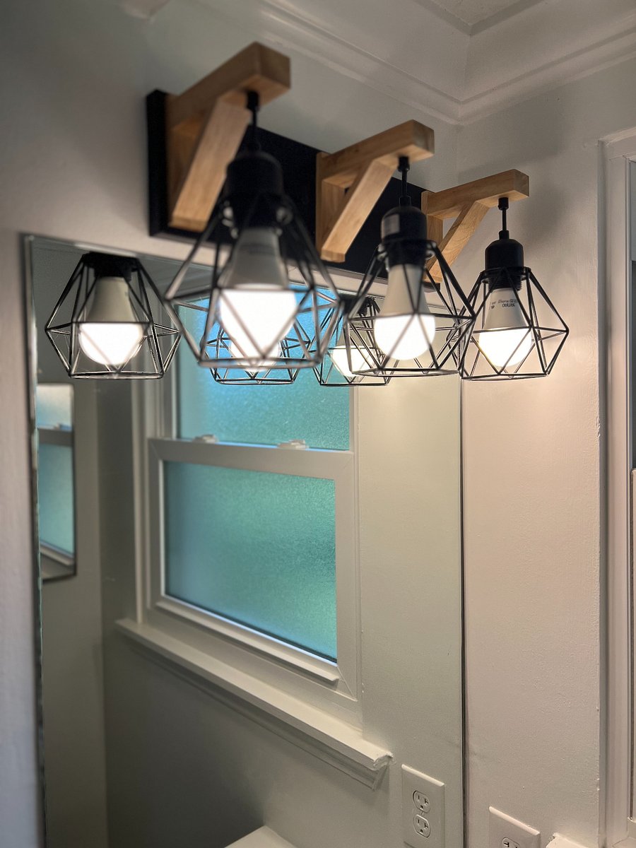 Beautiful vanity lights in master bathroom